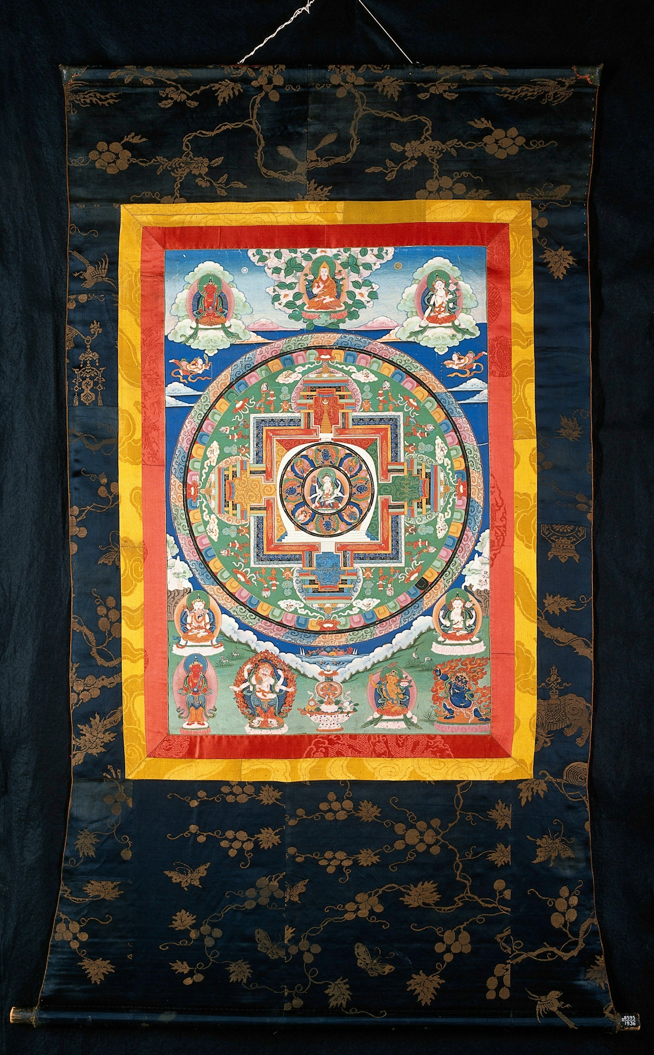 A buddhist mandala gouache painting depicting eight-handed goddess Usnisavijaya.