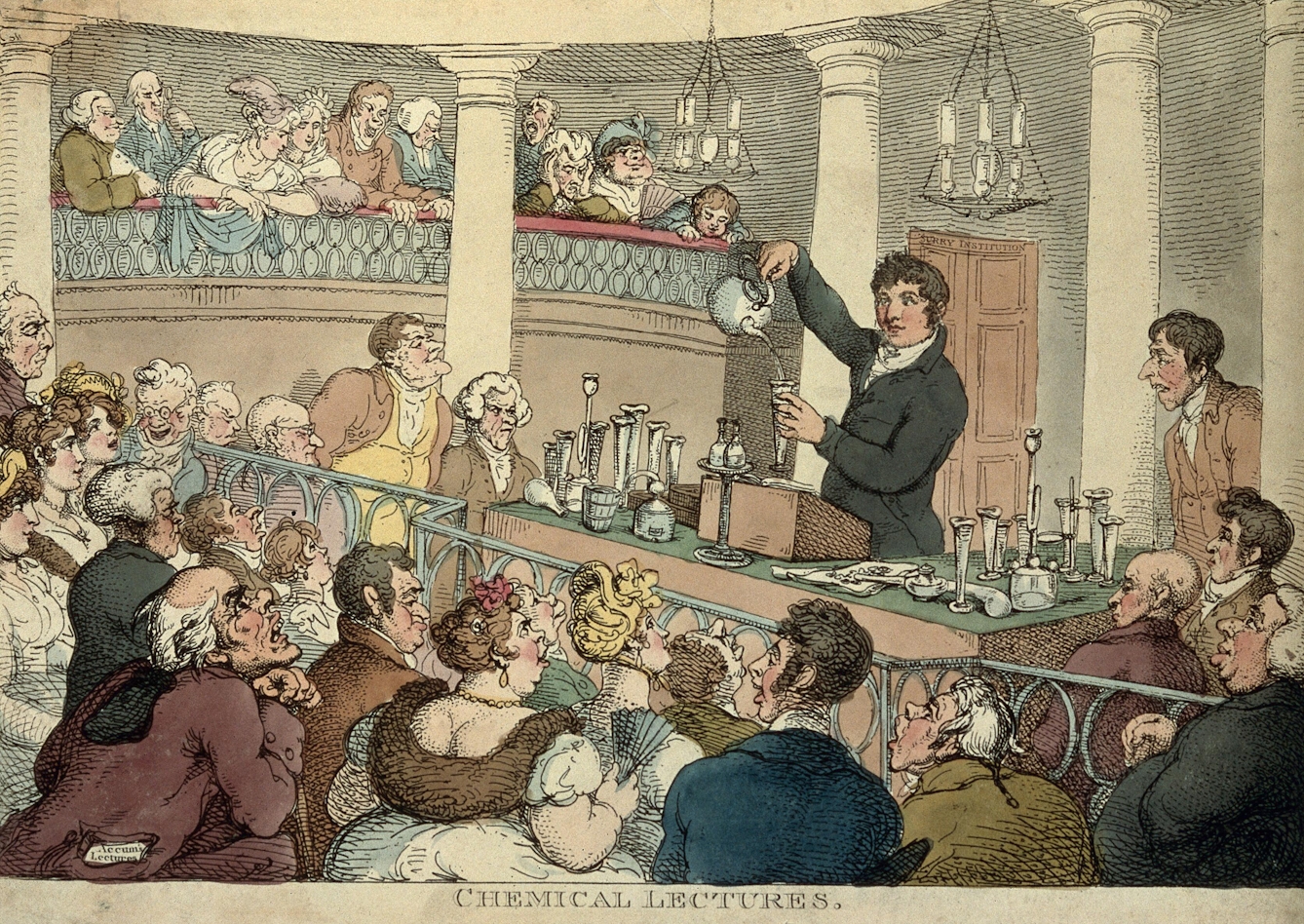 Caricature colour print of a young man giing a scientific demonstration to a rapt audience of wealthy early 19th century men and women in a lecture theatre. He is pouring a liquid into a scientific glass vessel from a kettle.