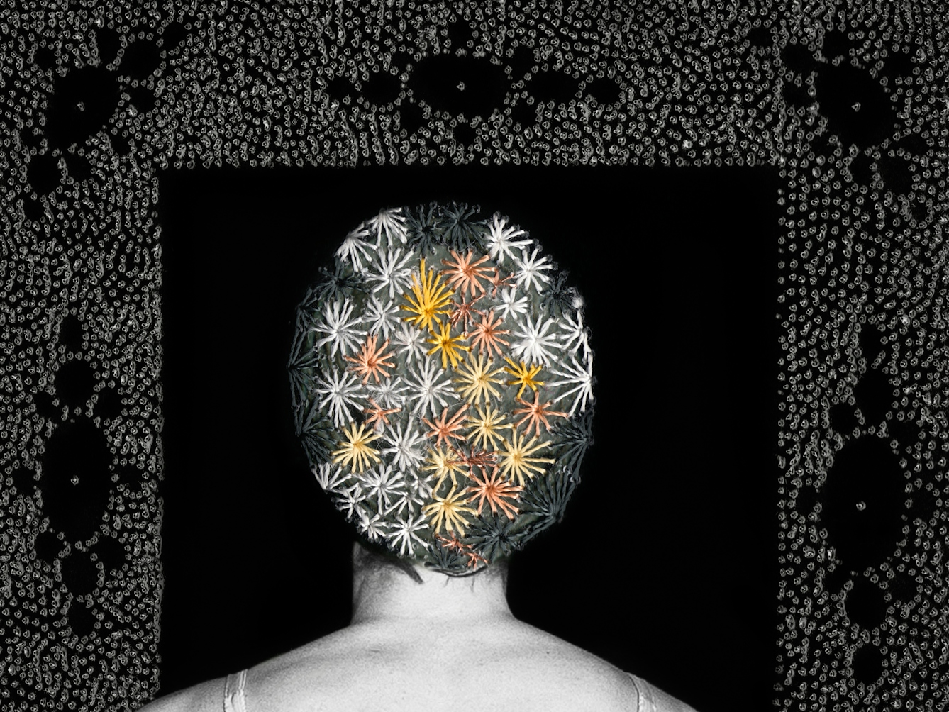 Artwork made up of a black and white photograph of the head of a female figure from behind, against a black background. Embroidered into the photographic print with yellow, orange and white coloured thread is a crisscross floral pattern which exactly covers her head and hair. In front of the figure is a large rectangular frame made up of a layered texture of grey dots which forms a doorway.