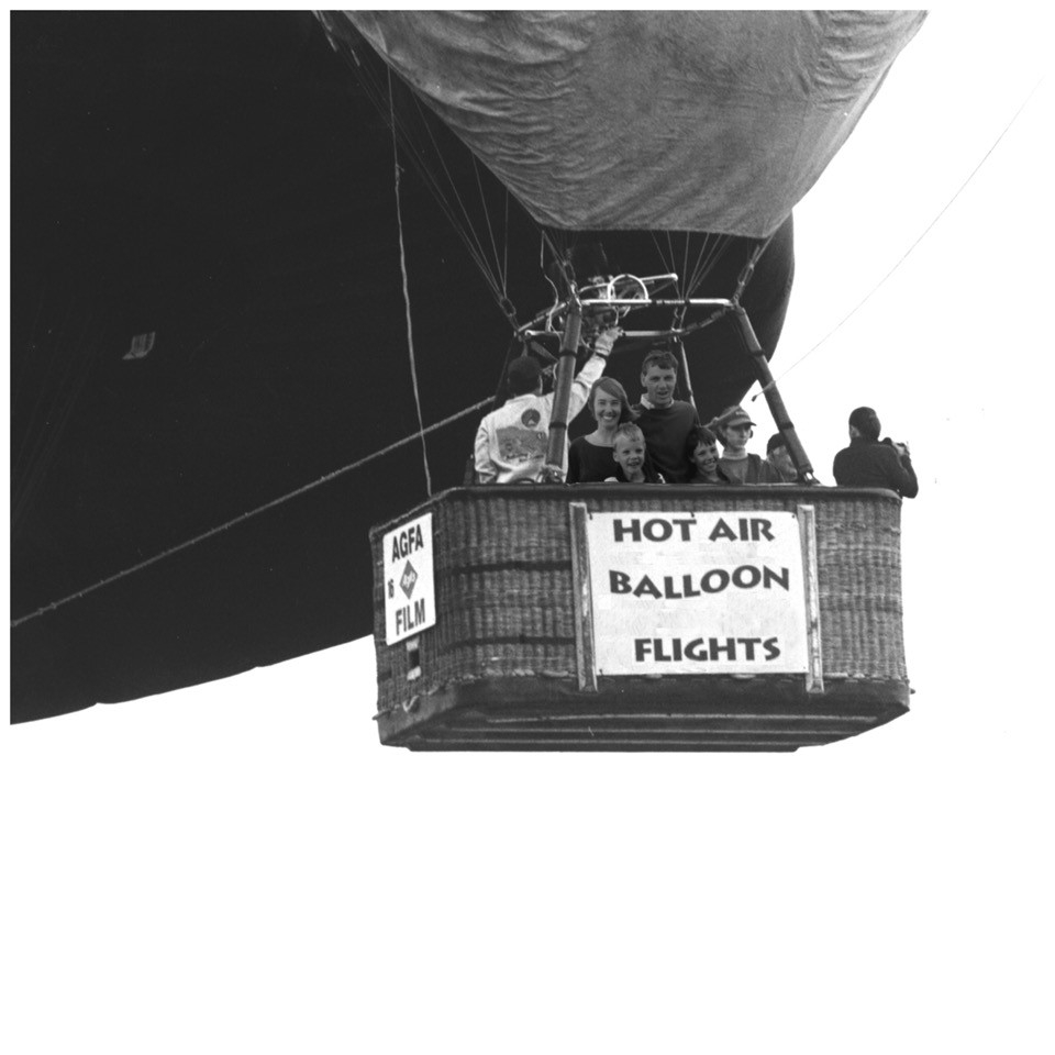 Doctored image of hot air balloon with people in the basket