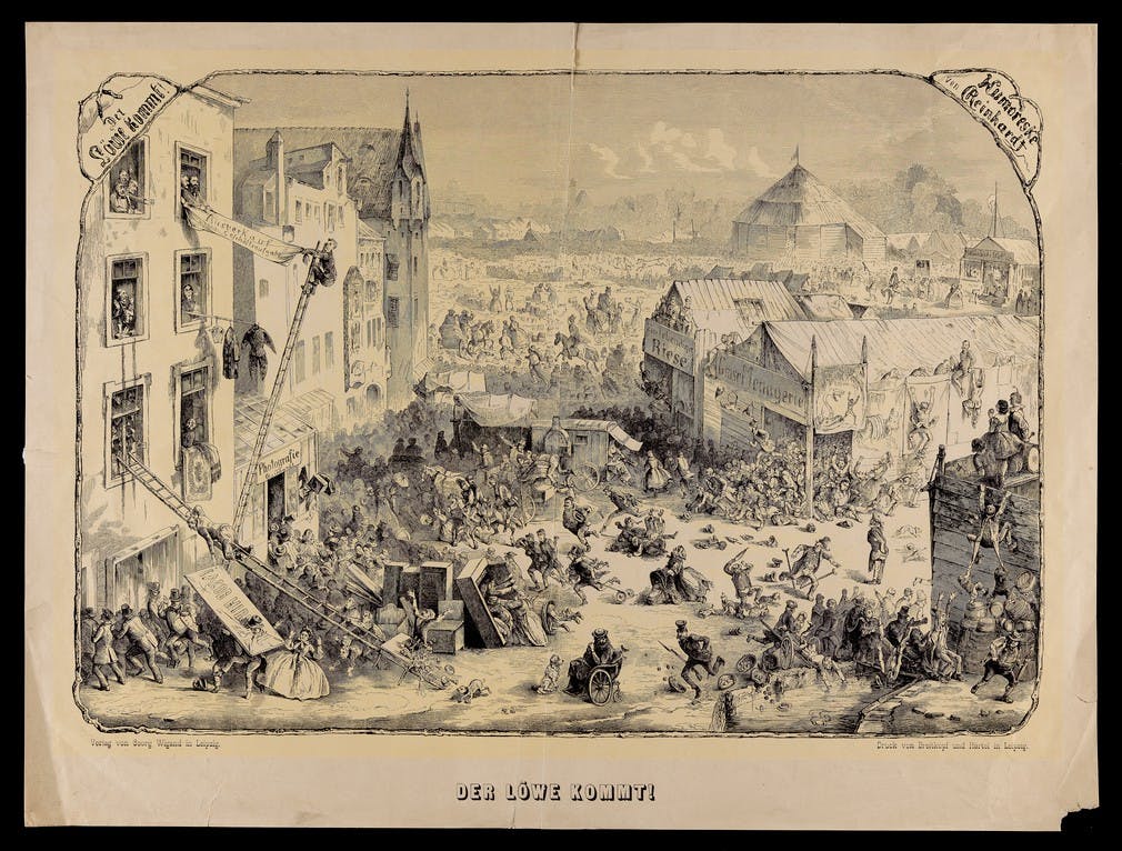 This litograph shows a scene with a circus in the distance and shops in the foreground. The work is a self-portrait of Reinhardt who is seated, paralysed in a wheelchair with crutches at the front. The lion has escaped and crowds are fleeing in panic. 