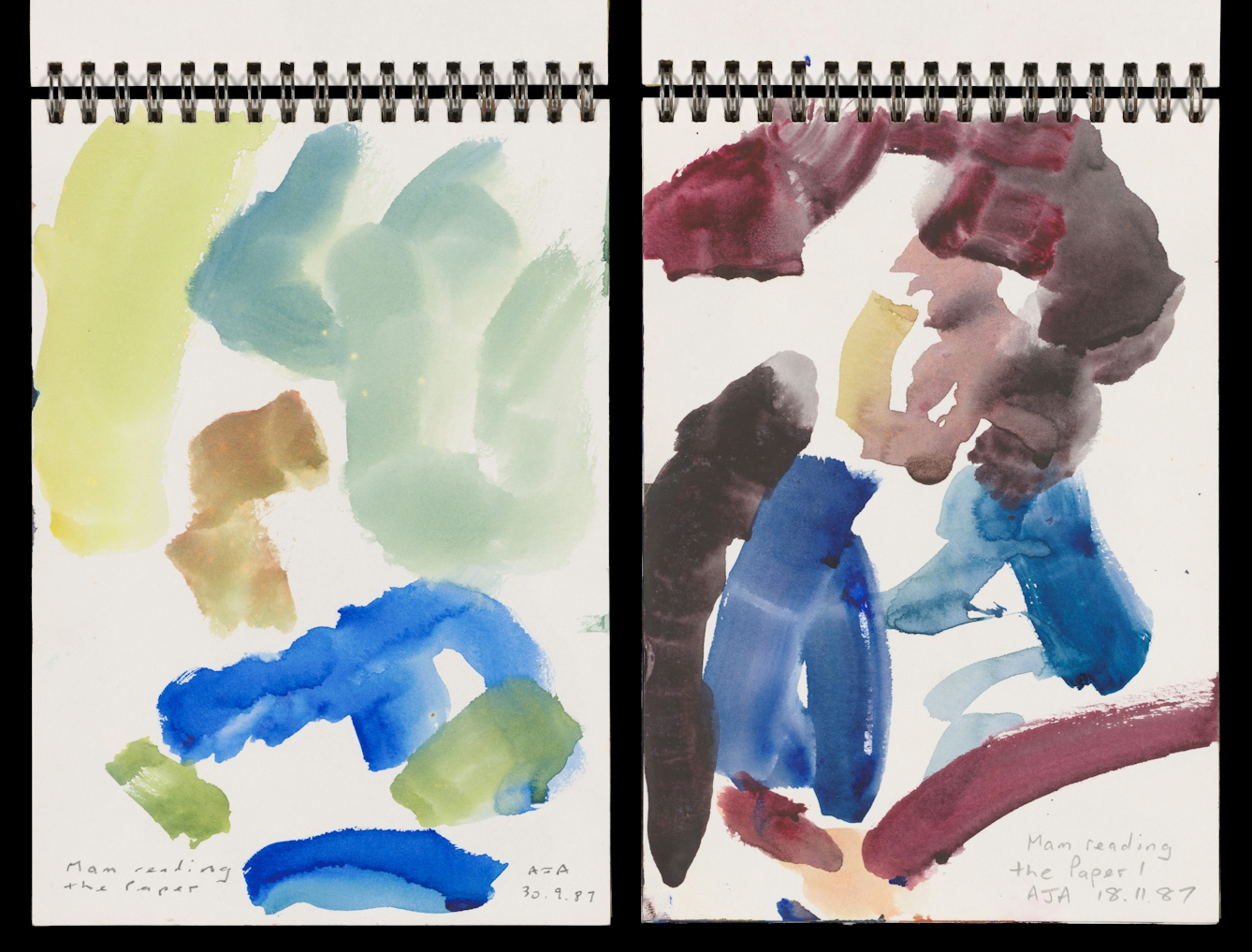 Photograph of an open page from two small sketchbooks. Both pages show an abstract painting made with a brush and paint in thick lines. The colours include yellow, blues and maroons. Both paints are hand titled, "Mam reading the paper". The one on the left is dated 30.9.87 and the one on the right is dated, 18.11.87.