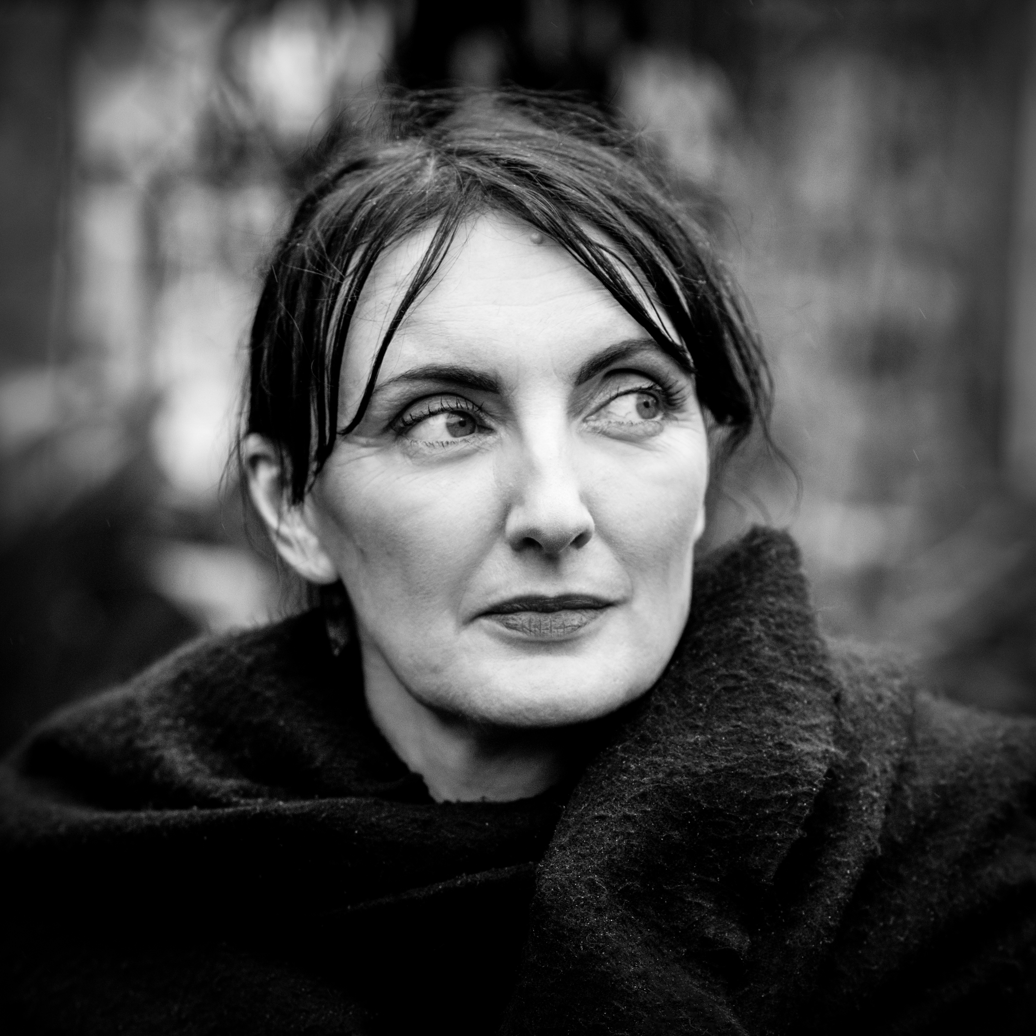 Photographic, black and white, head and shoulders portrait of Sinéad Gleeson.