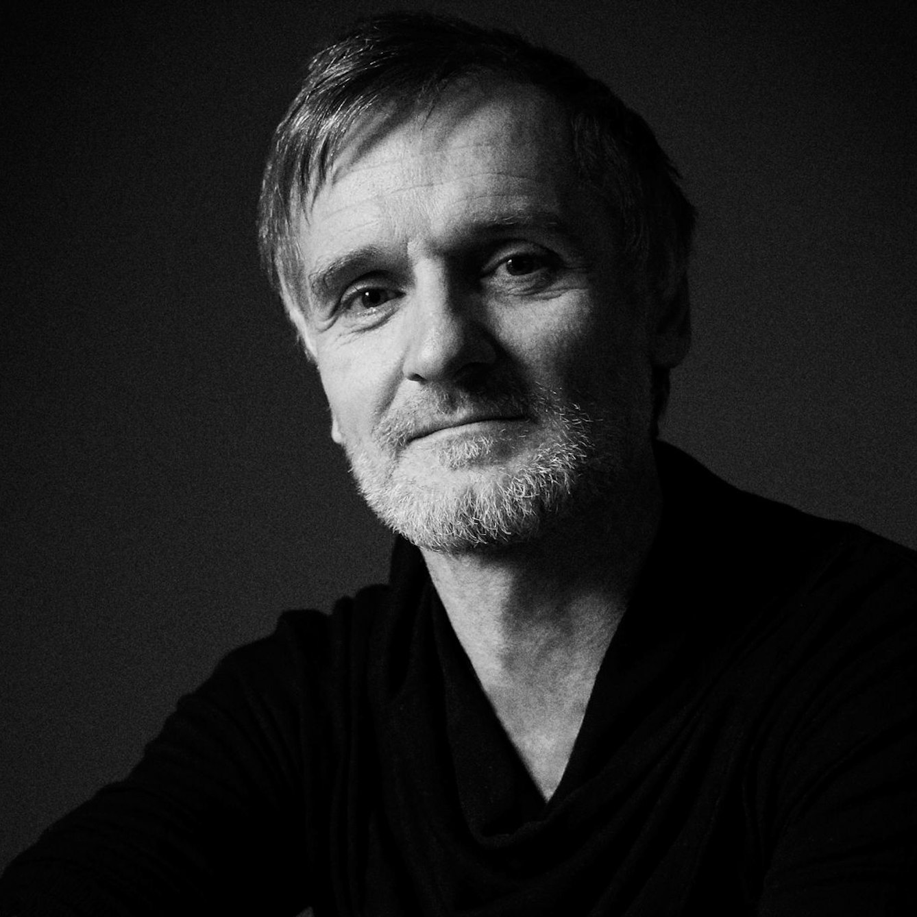 Photographic black and white, head and shoulders portrait of Matjaž Krivic.