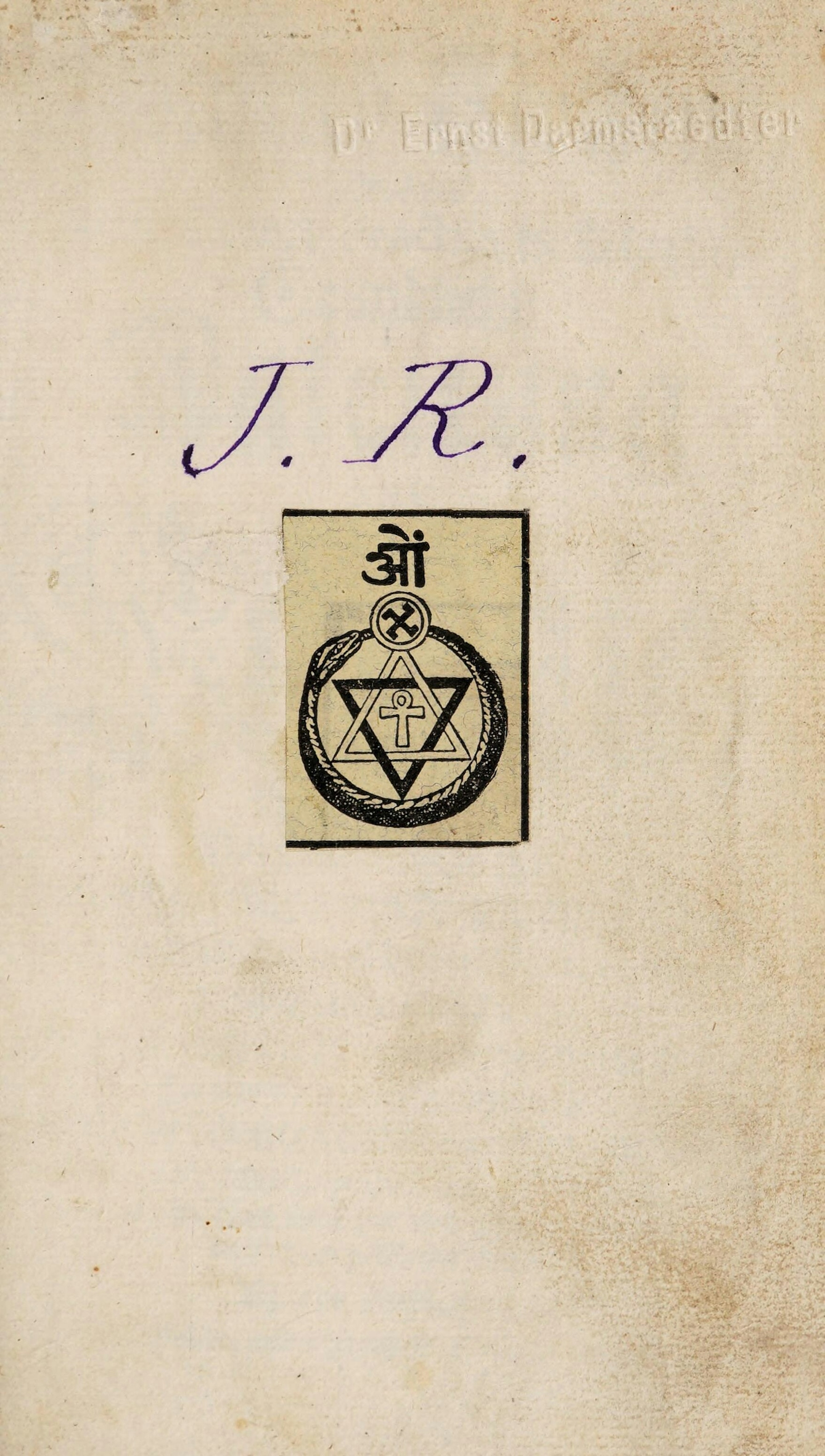 Bookplate on the centre of a page from a book.  The bookplate depicts a several mystic symbols and a snake eating its own tail.  Above the bookplate, the initials J.R. have been inscribed.