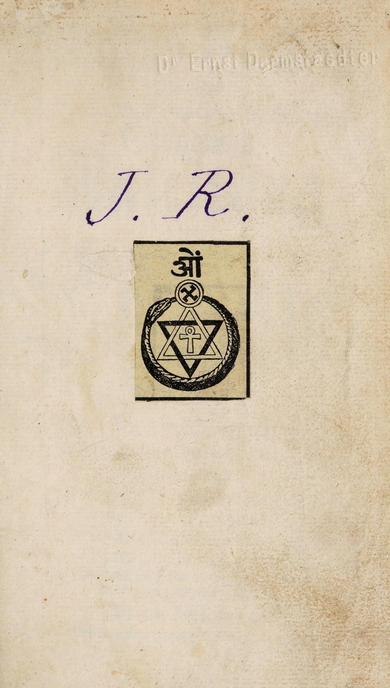 Bookplate on the centre of a page from a book. The bookplate depicts a several mystic symbols and a snake eating its own tail. Above the bookplate, the initials J.R. have been inscribed.