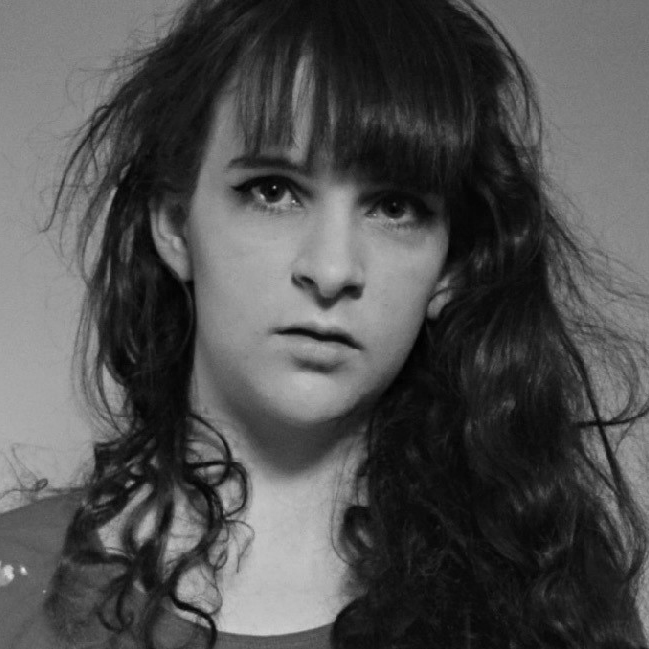 Black and white photograph of Georgie Evans