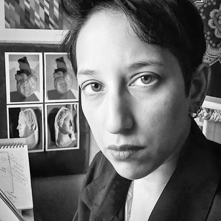 Photographic black and white, head and shoulders portrait of Bidisha.