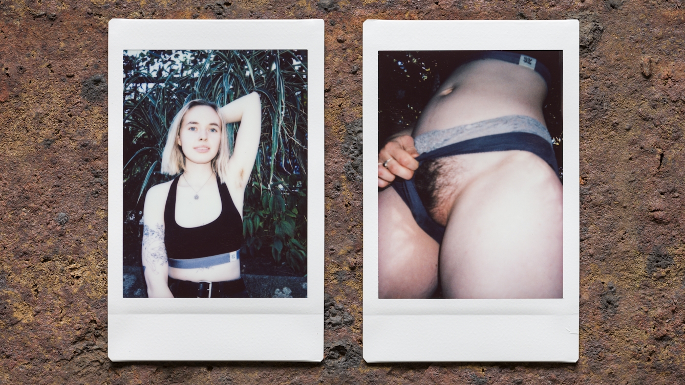 Photograph of two Instax Mini instant film prints in a line, resting on a textured brick surface. The two prints feature the same woman. The print on the left shows her nestled within the branches and leaves of a tree with her left arm raised up up to show her armpit hair. The print on the right shows a closeup, flash lit image of her groin and midriff. She is pulling aside her knickers to show her pubic hair. 