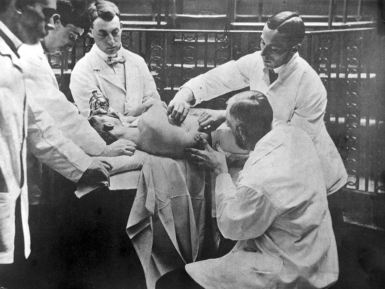 Sir Rickman John Godlee performing a surgical operation