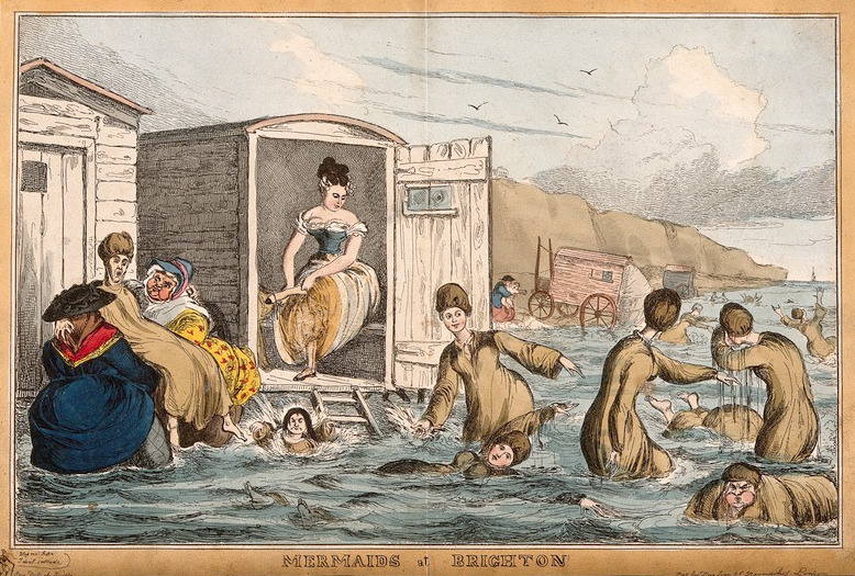 Women bathing in the sea, one changing into swimming clothes in a wooden bathing machine, another is helped into the water by two large fully dressed women.
