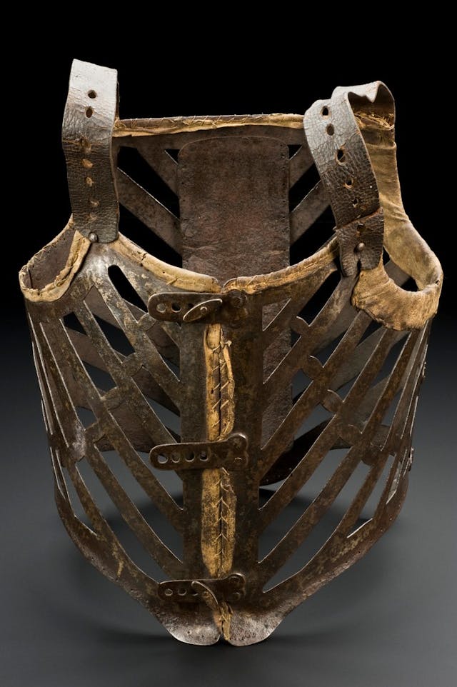 Photogaph of a metal and leather corset to fit an adult male, 1601-1800