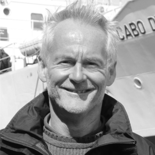 Black and white photograph of Martin Sixsmith