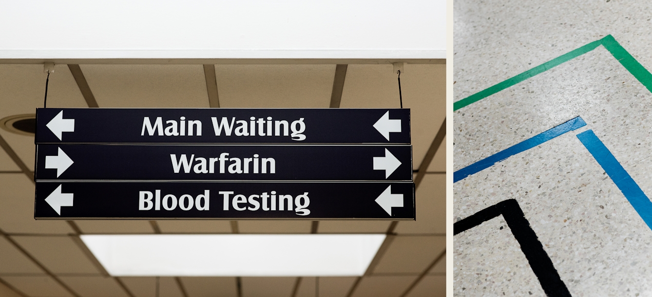 Photographic diptych showing two hospital interiors. The image on the left shows signage hanging from the ceiling with bold arrows directing people to, 'Main Waiting', 'Warfarin' and 'Blood Testing'. The image on the right shows three route finding lines on the floor, coloured green, blue and black. The blue line is interrupted by a break in the line.