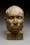 Image of death mask, a painted plaster head representing French criminal Norbert