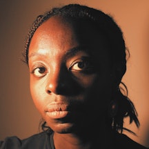 Colour photograph; head and shoulders portrait of Adjoa Wiredu.