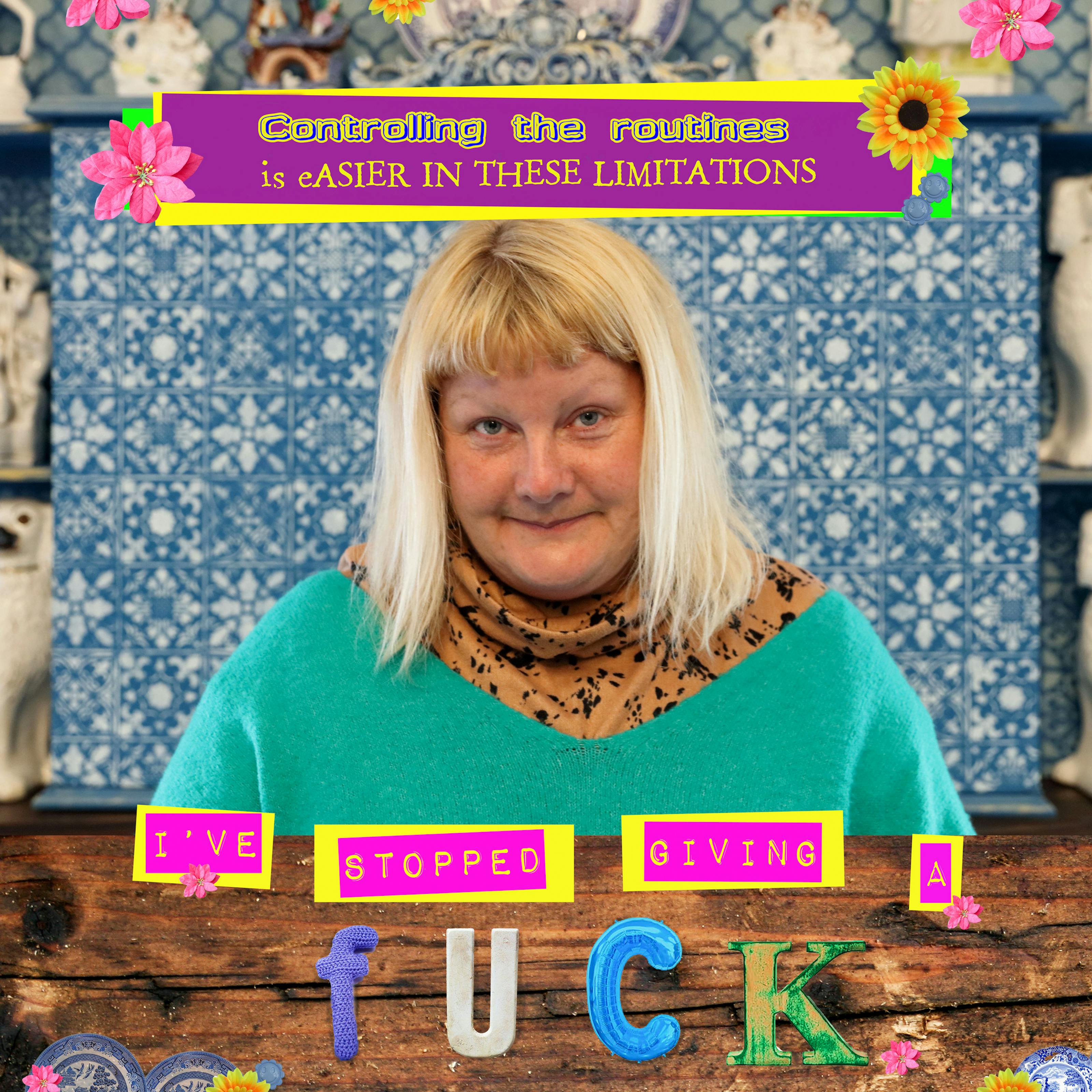Photographic montage artwork showing the head and shoulders of a woman with bold shoulder length hair and a turquoise sweater, looking straight to camera. She is sat in front of a blue and white patterned tiled chimney breast with shelves on either side supporting a selection of white ceramic figures depicting dogs and people. Digitally montaged over the top of the portrait to the left and right are small doll like figurines, colourful yellow and orange flowers and blue and white Dutch Delft style plates. Above the woman's head is typed "Controlling the routines is easier in these limitations" in yellow and purple fonts. Below her is typed, "I've stopped giving a fuck".
