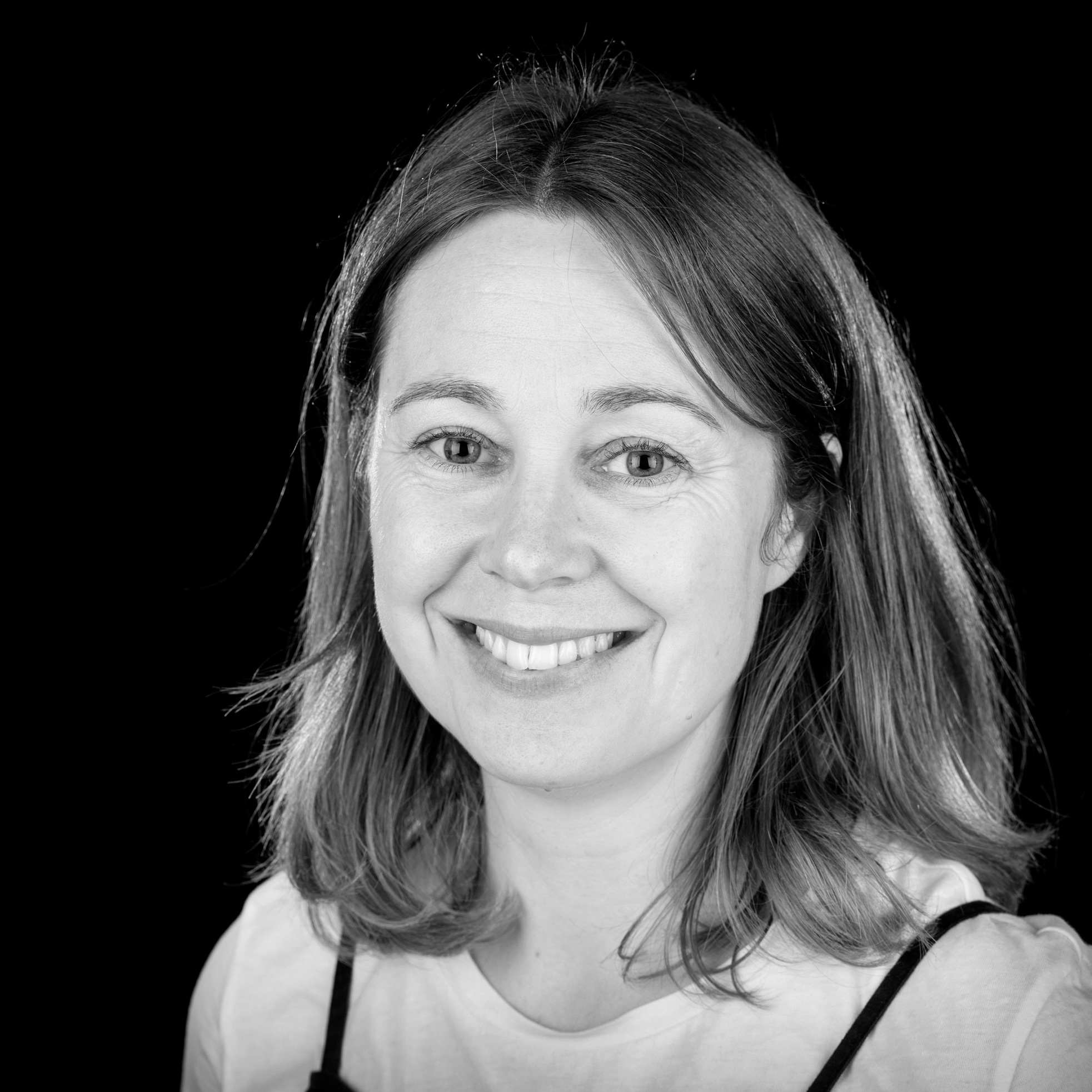 Photographic head and shoulders, black and white portrait of Kathleen Arundell.