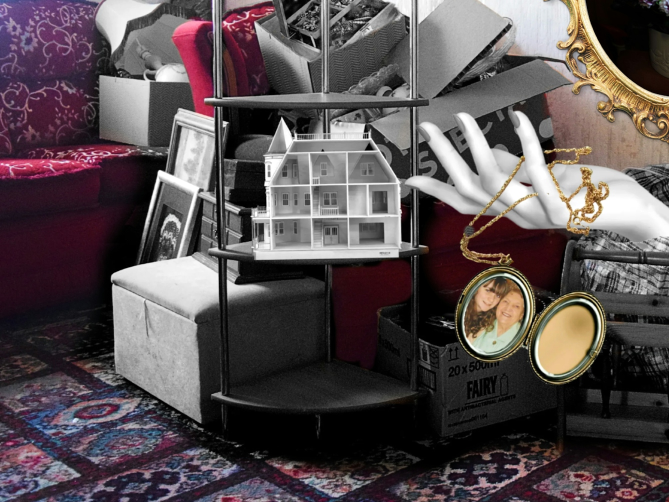 Crop of a larger colourful photograph with some coloured and black and white collage elements. The photo is of an empty living room with patterned off-white wallpaper, a red floral patterned sofa and a patterned carpet. There are pieces of black and white furniture in a pile next to and on top of the red sofa, including lamps, picture frames, storage bags, jewellery boxes and a shelving unit. On the shelving unit is a three story dollhouse which is empty. A black and white mannequin hand is shown coming out of a storage bag, and laced between its fingers is a golden pendant which is open and contains a photo of a girl and her grandma. On the wall is a ornate golden photo frame that contains a photo of a vase of different coloured flowers and a hairbrush.