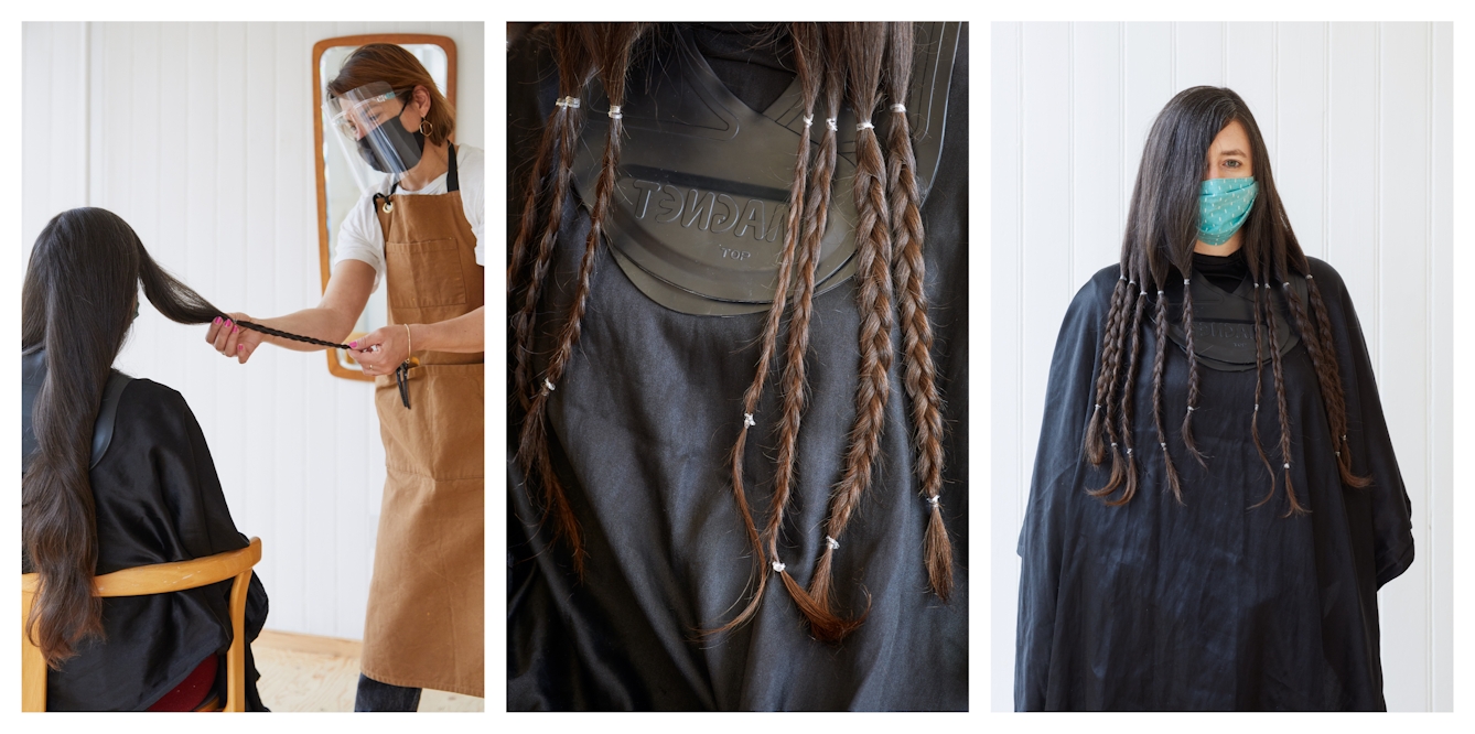 Photographic triptych. The image on the left shows a woman with long brown hair reaching almost down to her waist sat in a chair with a hairdressing cape over her shoulders. Standing to her right in a brown hairdressing apron, black face covering and a transparent visor is a woman who is holding a length of plaited hair. The image in the middle shows a close-up of the seated woman's upper chest, draped in the black hairdressing cape. Resting on the cape are 7 lengths of plaited hair. The image on the right show the same woman standing against a white wooden panelled wall, still in her hairdressing cape and a blue patterned face covering. Her hair is now all in plaited lengths. She is looking towards the camera.