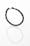 Photograph of the Grafenberg intrauterine device (IUD), Europe, 1925-1935. Grey silver wire coil ring on white background.