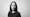 Photographic black and white, head and shoulders portrait of Bidisha SK Mamata.
