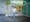 Photographic full length portrait of Sarah Itam, urological surgeon, outside University College London Hospital.