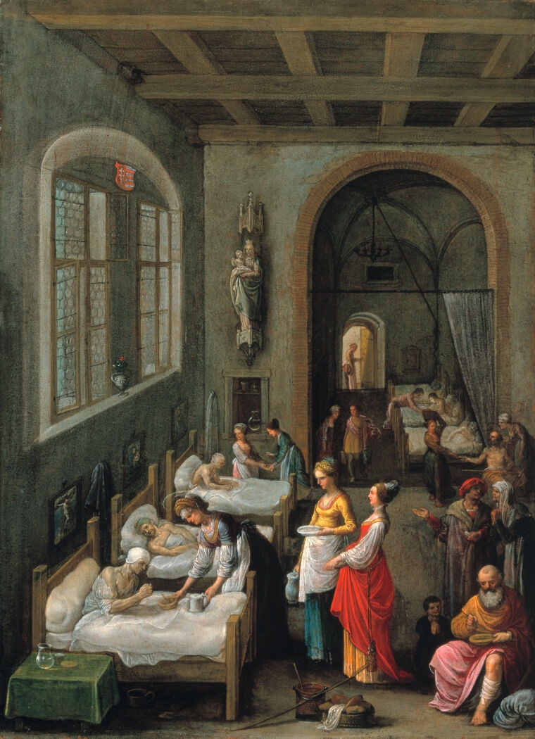 Colour painting showing Saint Elizabeth of Hungary, with a halo, offering a bowl of food and a tankard of drink to a man who sits up in bed. Next to the bed in the left foreground is a table covered by a green cloth, on which is a glass jug of water, and underneath the bed is a chamber pot. Two other patients lie in other beds in the room. Above each bed is a framed painting of a sacred subject. A large statue of the Virgin and Christ Child is mounted on one of the end walls. Two ladies attending Saint Elizabeth of Hungary stand in the centre of the room, and other people stand or sit around. Beyond, an arch divided from the front ward by a curtain which is drawn back to reveal another ward with three beds, each holding one patient

Above left, there is a large arched window, with a coat of arms placed within the top of the window embrasure. 