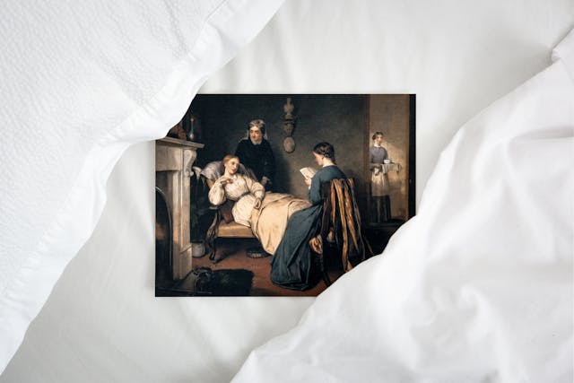 Watercolour painting laid on top of a white duvet. 

The painting shows a young unwell woman lying on a chaise lounge, a nurse is behind her. There is another woman who is sitting on a chair and reading to the unwell girl. In the background, there is a maid carrying a tray with a bowl on it. 