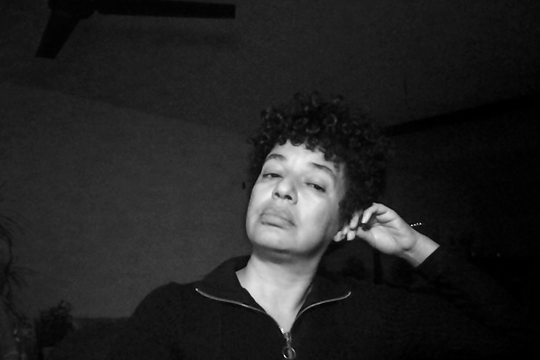 Black and white headshot of Vânia Gala