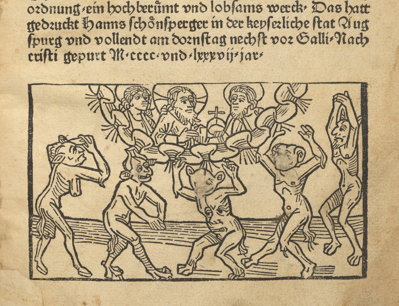 Photograph of a page from an early printed book where a previous owner has tried to rub out the faces of some of the demons.