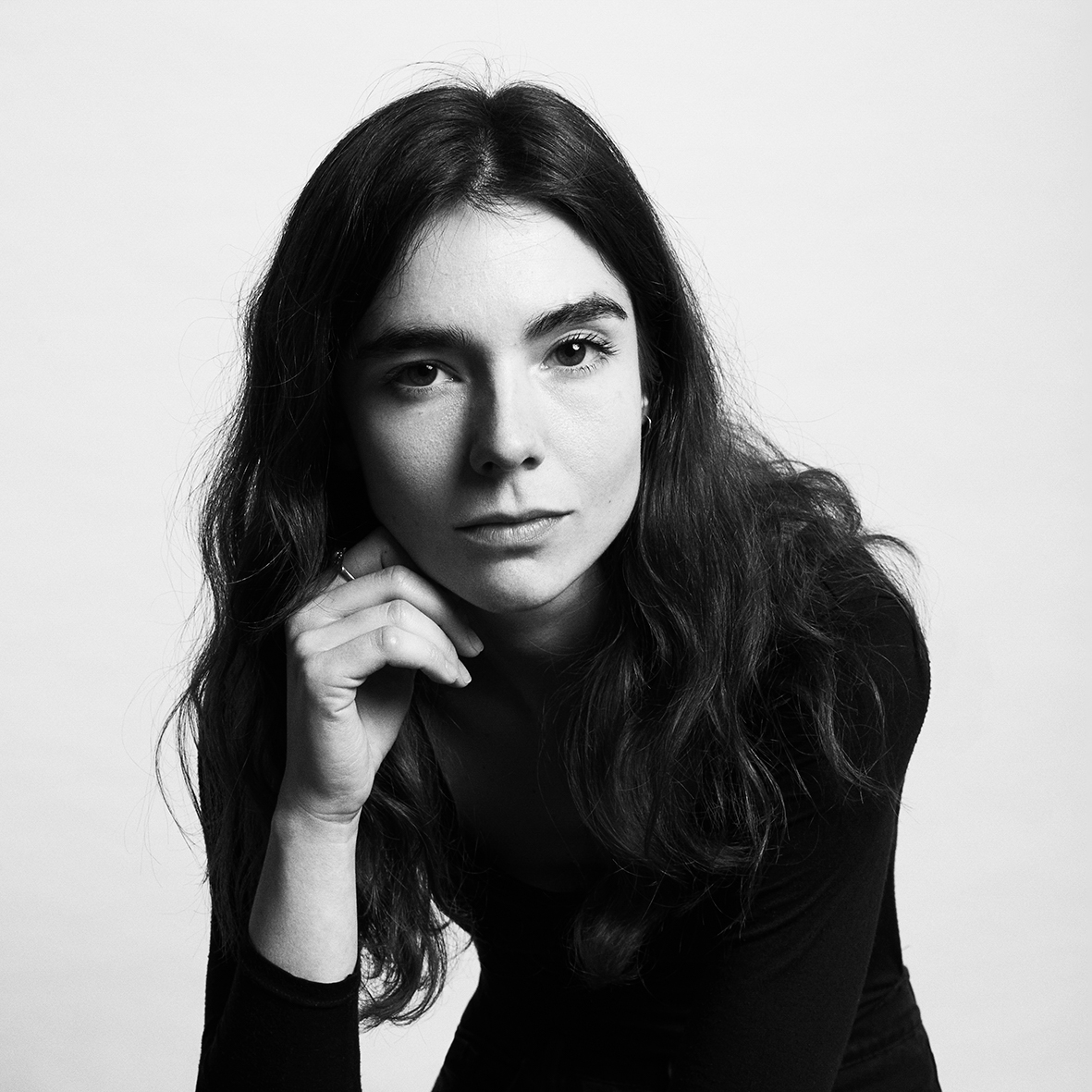 Black and white head and shoulders portrait of Manon Ouimet.