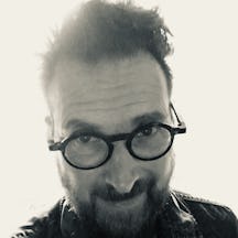 Black and white head-shot of comic artist Ian Williams