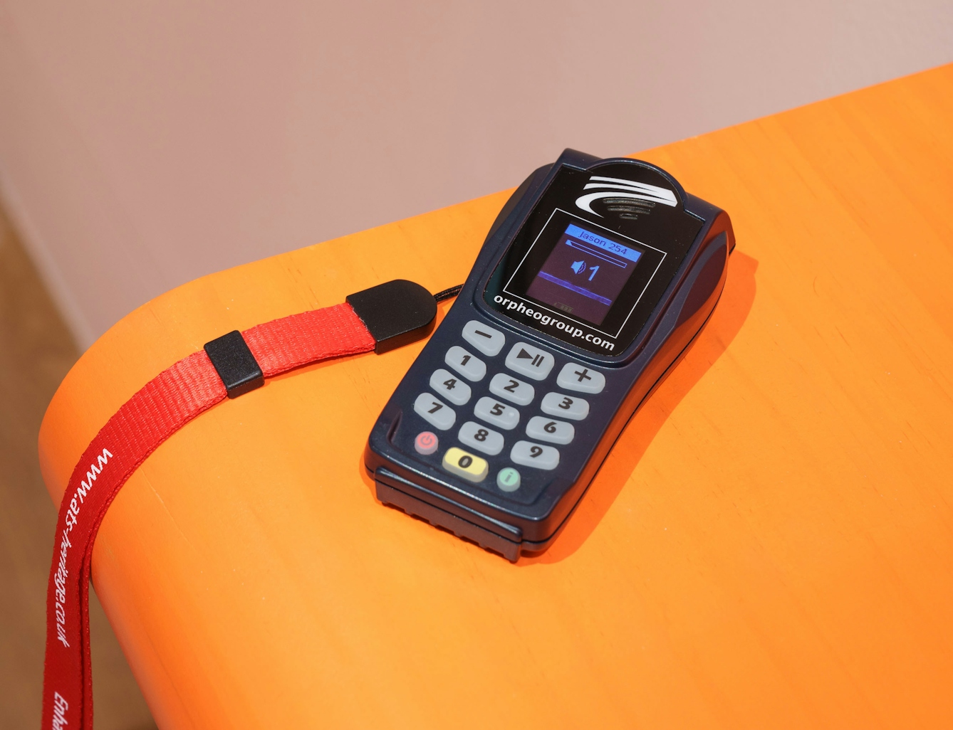 Photo of a touch-button handset to hear the audio-described digital guide.