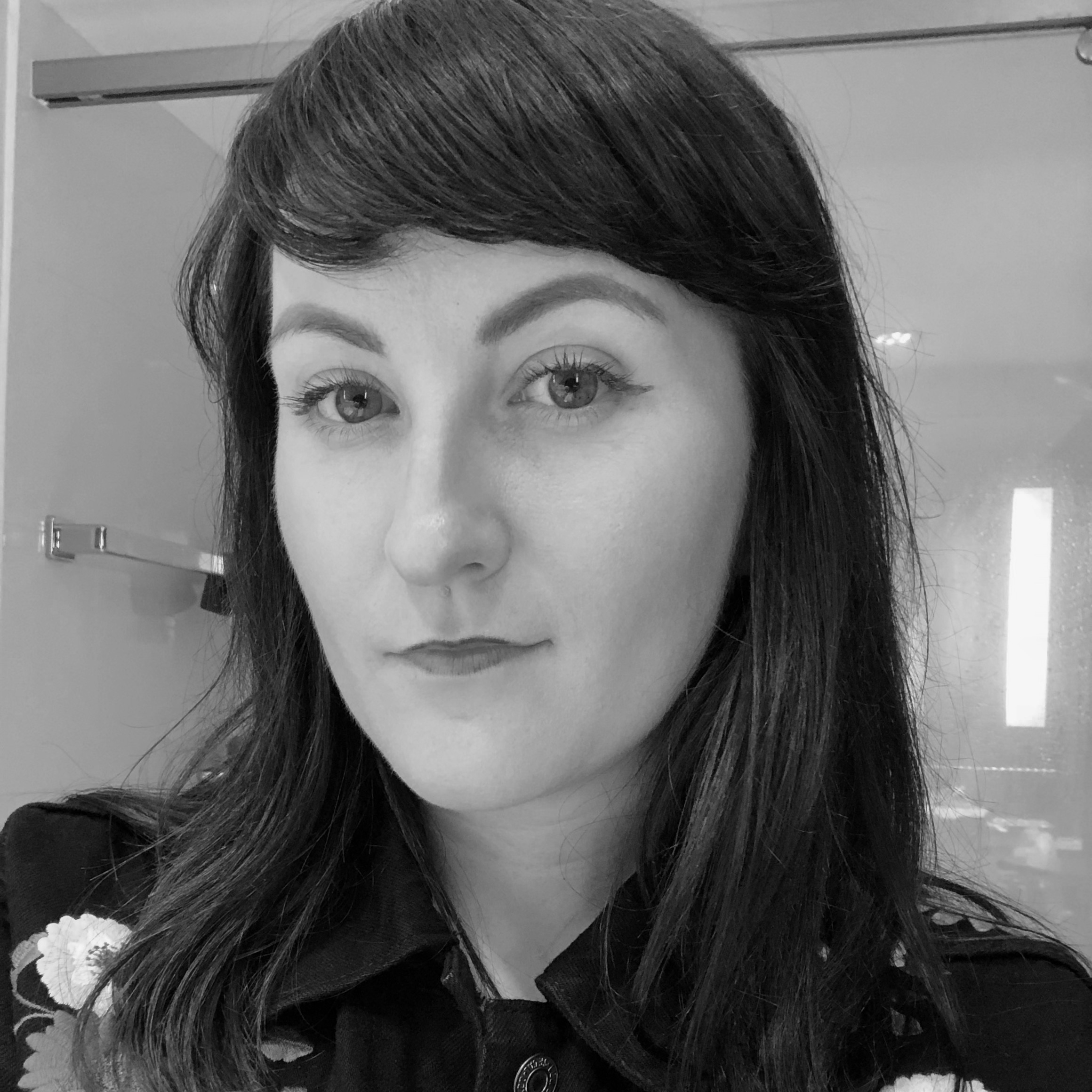 Black and white photograph of Em Ledger