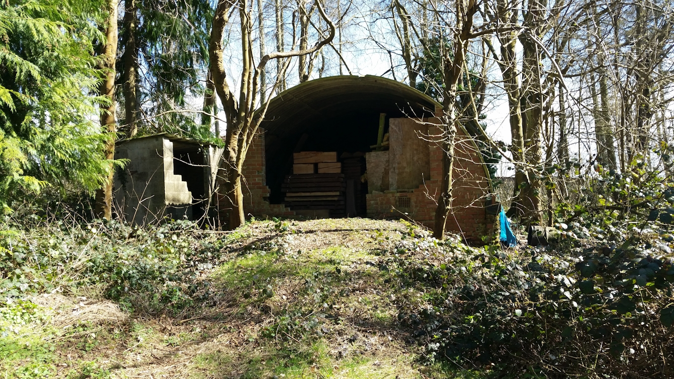 A surviving Quonset hut at the site of the field hospital where Dwight Harken operated.