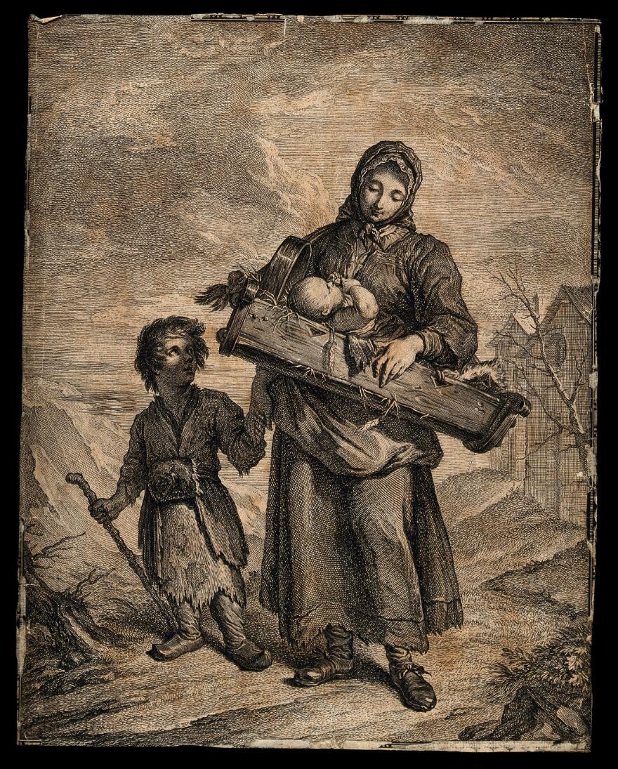 Engraving featuring a woman holding a baby and holding a child's hand. She is wearing a shawl and standing on a dirt path.