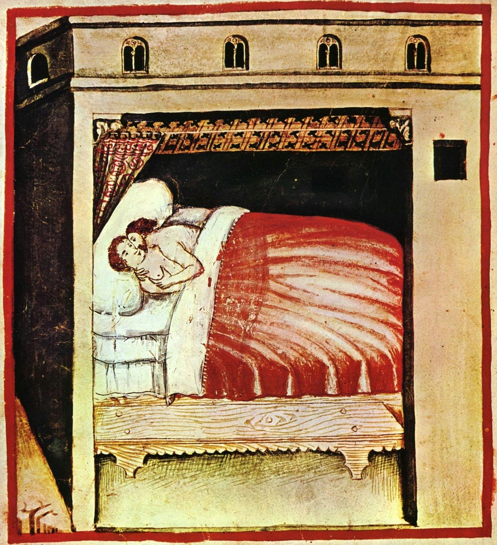 An illustration of a couple embracing in a large wooden bed, half-covered by a red bedspread.