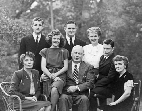 The Marston-Holloway-Byrne family. Left to right: Marjorie Wilkes Huntley, Byrne Marston, Olive Ann Marston, Pete Marston, William Moulton Marston, Olive Byrne, Donn Marston, and Elizabeth Holloway Marston (1947)