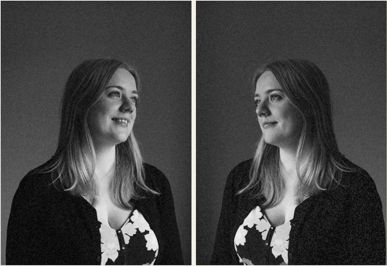 Photographic black and white diptych. The images both show the same young woman with blond hair, wearing a floral dress and black cardigan. In each image she is pictured in profile, looking towards herself in the other image, as if in a mirror. The image is very dark in tone, with just her profile picked out in the light. In the image on the left the woman is smiling. In the image on the right she has a more neutral expression.