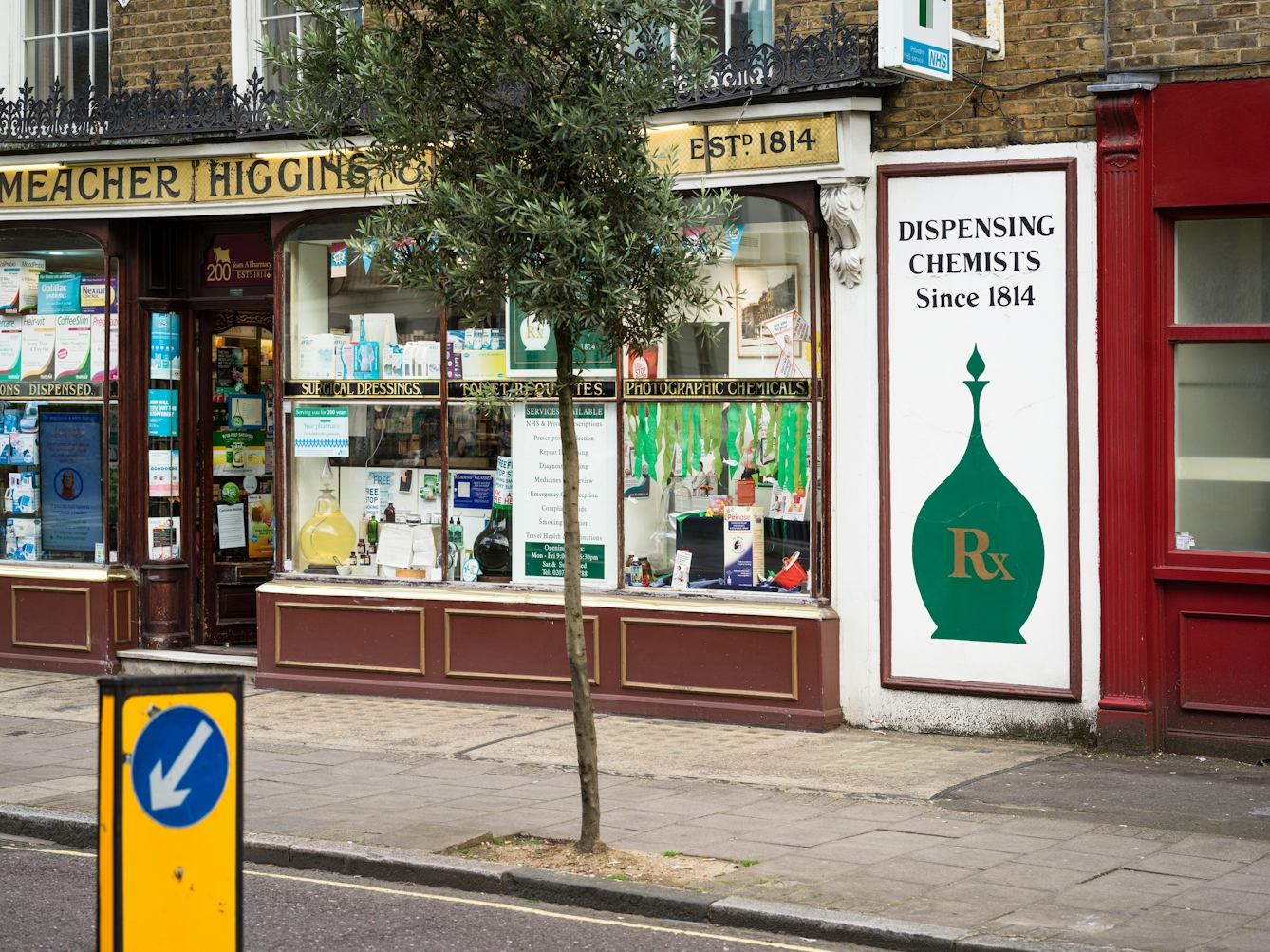 Shop front for Meacher Higgins chemist, London