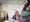 Photograph of Sarifa Patel talking with another Trustee of the charity, ALLFIE.
