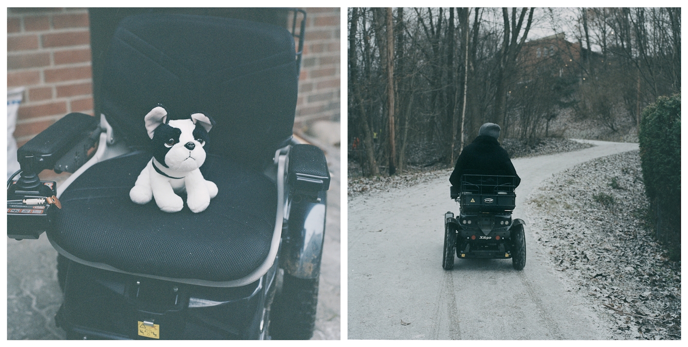 Photographic diptych made up of two square images. The image on the left shows a small soft black and white toy dog sitting on the seat cushion of an off-road electric wheelchair. The image on the right shows a man using an off-road electric wheelchair. He is pictured driving away from the camera, along a snowy path, winding though winter woodland. 