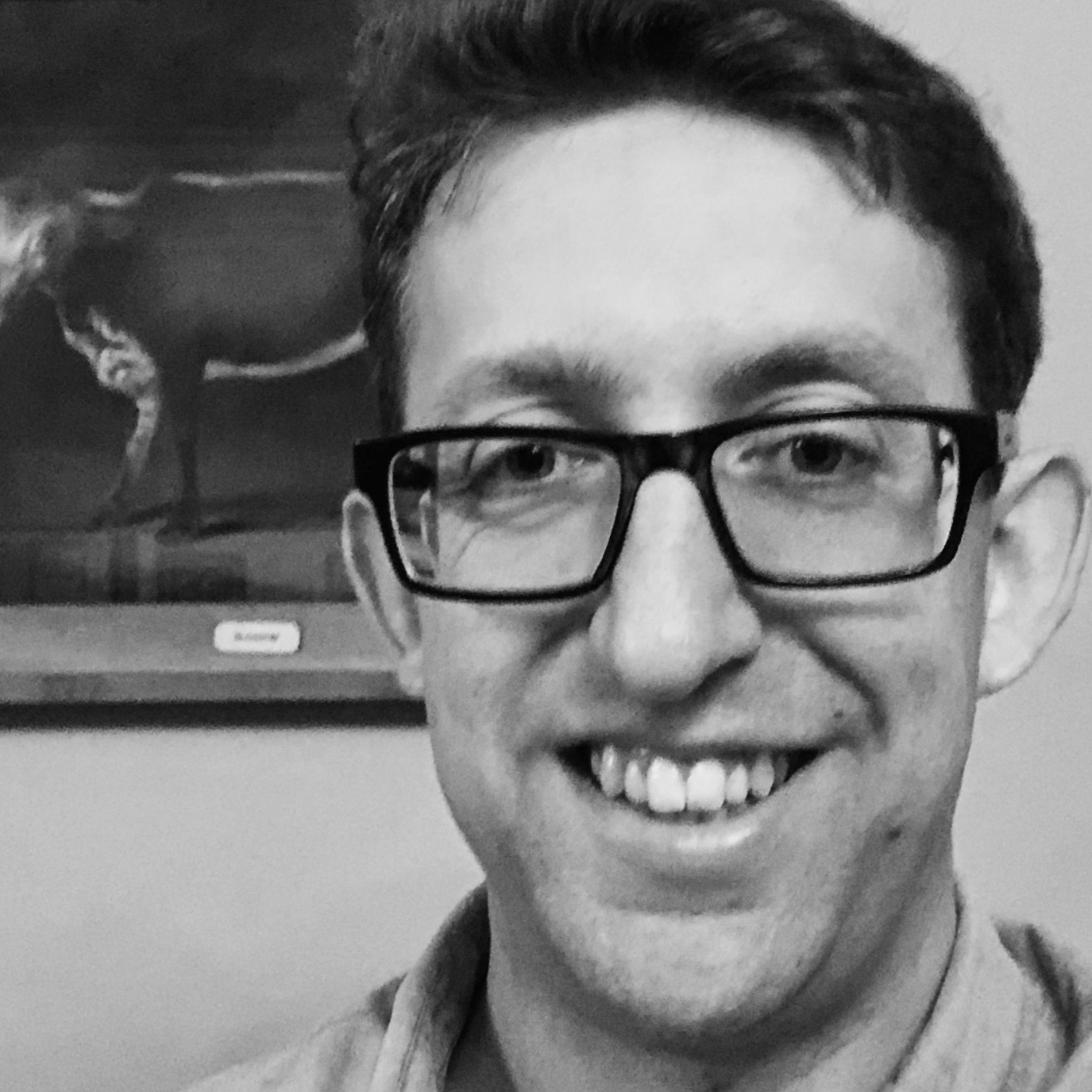 Black and white, head shot of Owen Gower