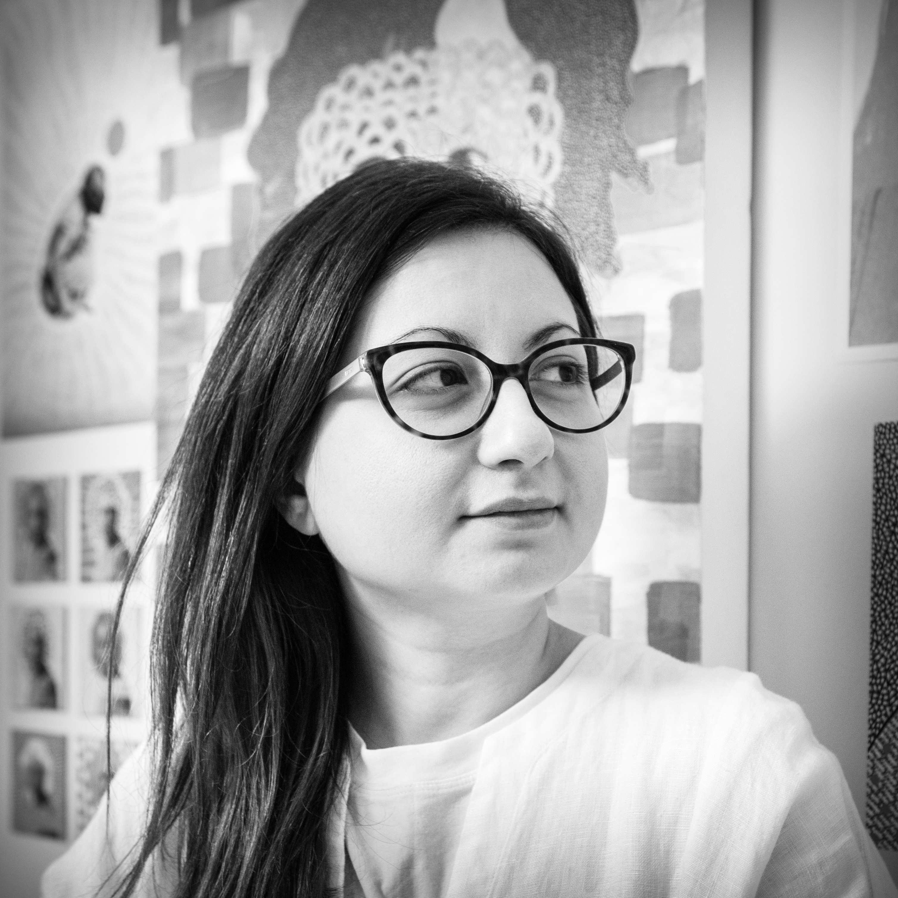 Black and white, head and shoulders portrait of Naomi Vona.