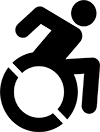 Icon showing someone using a wheelchair.