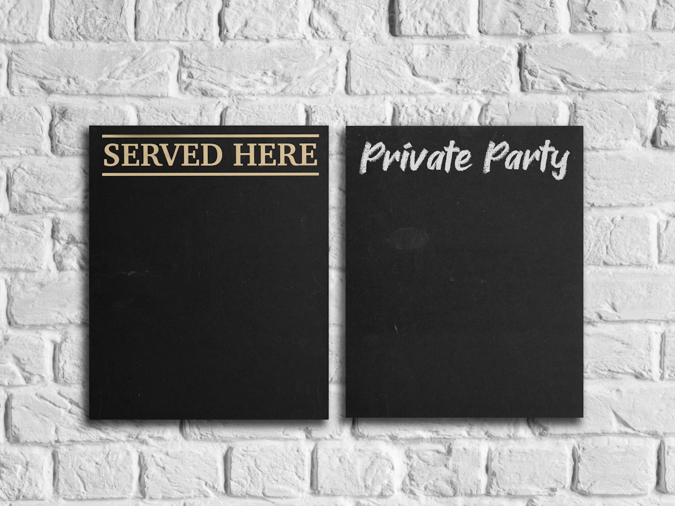 An image of two black chalkboard signs against a white brick wall. One sign has the words ‘Served Here’ printed on it, the other has ‘Private Party’ handwritten in chalk.