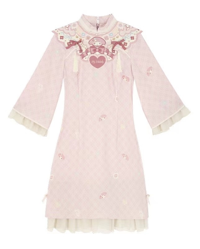 Photograph of a form-fitting pale pink dress with a cloud collar and kawaii (or cute Japanese-style) design elements such as bows and smiling faces and flowers. 