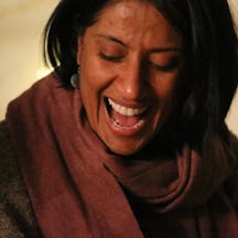 Photograph of Navreet Chawla laughing.