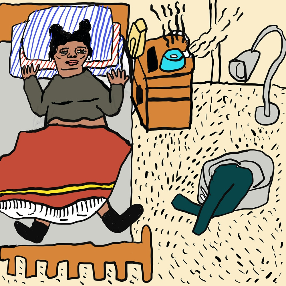Webcomic showing a person lying in a brown coloured bed within a bedroom with cream walls and flooring. The individual is half covered with a red blanket, wearing a grey coloured top and black socks, and is lying on three striped pillows. 